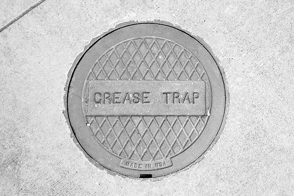 foul odors, slow-draining sinks, or gurgling noises in the plumbing system are signs that the grease trap may need pumping